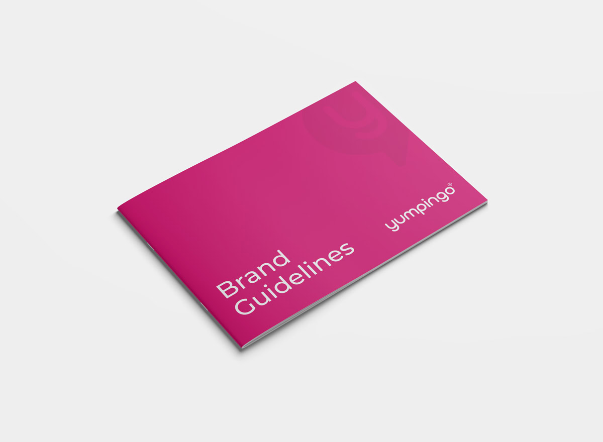 Cover design for the Yumpingo brand guidelines featuring the refreshed logo, pink gradient background, and subtle brand pattern
